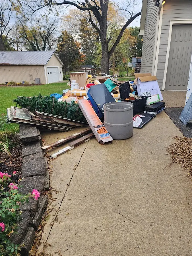 Dumpster being loaded with debris for 30 Yard Dumpster Rental in Nanticoke